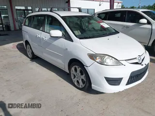 2009 Mazda 5 Grand Touring with VIN JM1CR293390333107, listed as a IAAI auction lot 42562234 with 66,625 mi miles and . Bid and sale history available at DreamBid. Image 1.