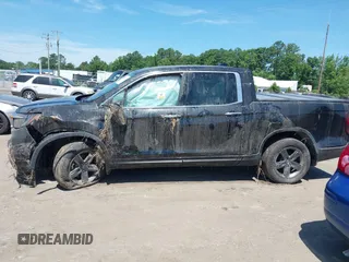 2022 Honda Ridgeline RTL-E with VIN 5FPYK3F75NB020232, listed as a IAAI auction lot 42549034 with 40,209 mi miles and . Bid and sale history available at DreamBid. Image 14.