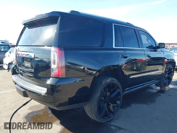 2018 GMC Yukon Denali with VIN 1GKS1CKJ1JR110344, listed as a IAAI auction lot 41720092 with 82,296 mi miles. Bid and sale history available at carsss.com. Image 4.