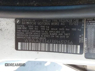2003 BMW 3 Series 325i with VIN WBAAZ33473PH31756, listed as a IAAI auction lot 41605387 with 187,410 mi miles. Bid and sale history available at carsss.com. Image 9.