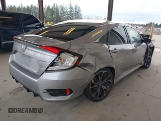 2021 Honda Civic Sport with VIN 2HGFC2F83MH521470, listed as a IAAI auction lot 41828890 with 49,703 mi miles and . Bid and sale history available at DreamBid. Image 4.