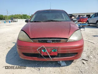 2004 Ford Focus LX with VIN 1FAFP33P64W200468, listed as a Copart auction lot 65288174 with 101,640 mi miles and Clean title. Bid and sale history available at DreamBid. Image 5.