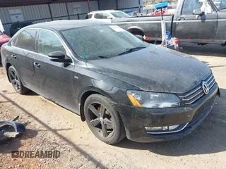 2015 Volkswagen Passat 1.8T Limited Edition with VIN 1VWAT7A36FC118099, listed as a IAAI auction lot 41919223 with 103,916 mi miles. Bid and sale history available at carsss.com. Image 1.