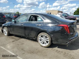 2023 Cadillac CT4 Luxury with VIN 1G6DK5RK4P0107157, listed as a Copart auction lot 71153704 with 12,336 mi miles and Salvage Title. Bid and sale history available at carsss.com. Image 2.