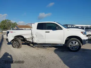 2013 Toyota Tundra с VIN 5TFRM5F1XDX054525, выставлен на аукционе IAAI как лот 41843019 с пробегом 157 047 миль миль и . История ставок и продаж доступна на DreamBid. Изображение 13.
