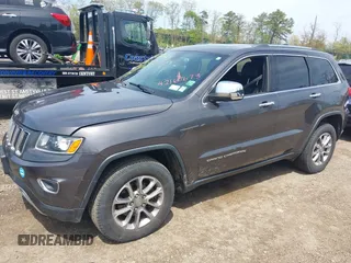 2016 Jeep Grand Cherokee Limited 75th Anniversary with VIN 1C4RJFBG1GC471228, listed as a IAAI auction lot 42167673 with 148,007 mi miles and . Bid and sale history available at DreamBid. Image 2.