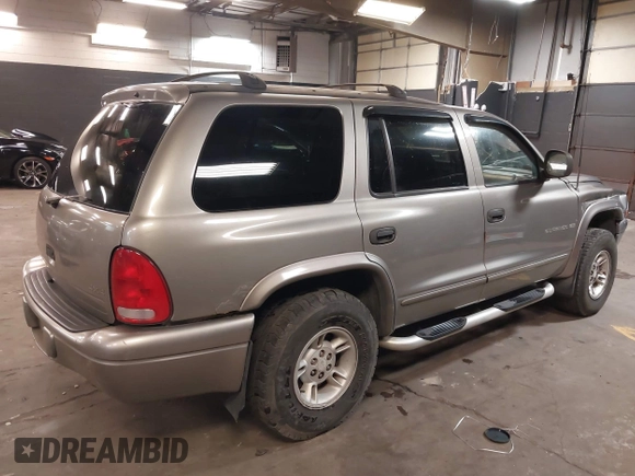 2000 Dodge Durango with VIN 1B4HS28N0YF279416, listed as a IAAI auction lot 41767387 with 157,649 mi miles and . Bid and sale history available at DreamBid. Image 4.