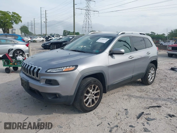 2014 Jeep Cherokee Altitude with VIN 1C4PJMCB4EW107556, listed as a IAAI auction lot 41881448 with 212,816 mi miles and . Bid and sale history available at DreamBid. Image 18.