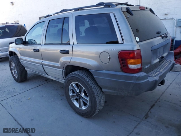 1999 Jeep Grand Cherokee Laredo with VIN 1J4GW58N9XC730311, listed as a Copart auction lot 77774544 with 0 mi miles and Salvage Title. Bid and sale history available at carsss.com. Image 2.