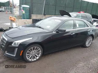 2014 Cadillac CTS Luxury AWD with VIN 1G6AX5SX9E0195923, listed as a IAAI auction lot 40946334 with Not Provided miles and . Bid and sale history available at carsss.com. Image 14.