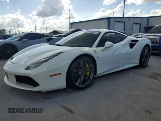 2016 Ferrari 488 z VIN ZFF79ALAXG0216223, wystawiony jako Copart lot #74210804 z przebiegiem Nie podano mil oraz Szkody całkowita. Historia ofert i sprzedaży dostępna na DreamBid. Obrazek 1.