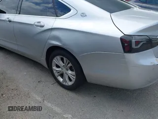 2014 Chevrolet Impala LT with VIN 2G1115SL4E9279660, listed as a IAAI auction lot 42675495 with 159,215 mi miles and . Bid and sale history available at DreamBid. Image 21.