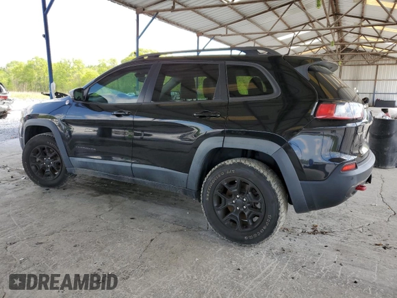 2019 Jeep Cherokee Trailhawk with VIN 1C4PJMBN7KD374676, listed as a Copart auction lot 51504125 with 34,323 mi miles and Salvage Title. Bid and sale history available at DreamBid. Image 2.
