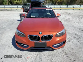 2016 BMW 2 Series 228i with VIN WBA1K9C50GV710942, listed as a Copart auction lot 77700934 with 28,643 mi miles and Salvage Title. Bid and sale history available at carsss.com. Image 5.