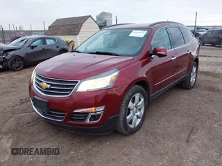 2016 Chevrolet Traverse LTZ z VIN 1GNKVJKD8GJ167038, wystawiony jako IAAI lot #41878254 z przebiegiem 159 771 mil mil oraz . Historia ofert i sprzedaży dostępna na DreamBid. Obrazek 2.