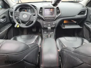 2019 Jeep Cherokee Trailhawk with VIN 1C4PJMBX7KD341534, listed as a Copart auction lot 52352765 with 207,532 mi miles and Salvage Title. Bid and sale history available at DreamBid. Image 8.