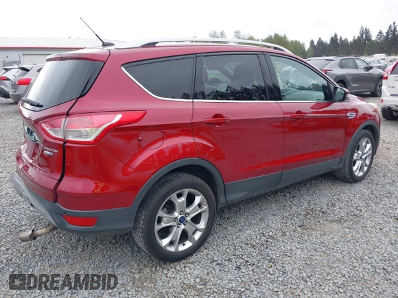 2014 Ford Escape Titanium with VIN 1FMCU9J9XEUD71715, listed as a IAAI auction lot 42127982 with 96,549 mi miles and . Bid and sale history available at DreamBid. Image 4.