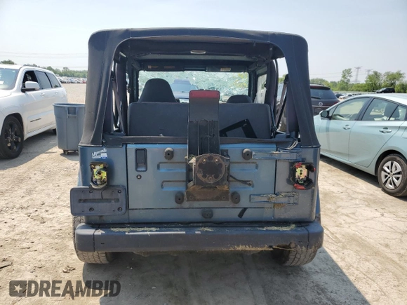 1999 Jeep Wrangler SE with VIN 1J4FY29P0XP422425, listed as a Copart auction lot 60513335 with Not provided miles and Clean title. Bid and sale history available at DreamBid. Image 6.