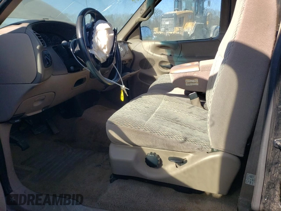1997 Ford F-150 with VIN 1FTDX1722VNB96527, listed as a Copart auction lot 87304814 with 106,771 mi miles and Salvage title. Bid and sale history available at DreamBid. Image 7.