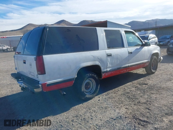 1999 Chevrolet Suburban with VIN 3GNEC16R1XG208071, listed as a IAAI auction lot 41422385 with 152,692 mi miles. Bid and sale history available at carsss.com. Image 4.