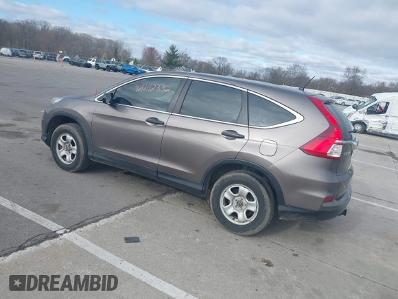 2015 Honda CR-V LX with VIN 5J6RM4H35FL127992, listed as a IAAI auction lot 42042332 with 141,642 mi miles and . Bid and sale history available at DreamBid. Image 3.