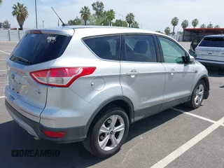 2015 Ford Escape SE with VIN 1FMCU9G93FUA26339, listed as a IAAI auction lot 42039281 with 185,729 mi miles and . Bid and sale history available at DreamBid. Image 4.