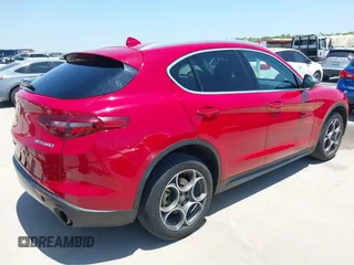 2018 Alfa Romeo Stelvio z VIN ZASFAKAN8J7B64173, wystawiony jako IAAI lot #42355202 z przebiegiem 111 698 mil mil oraz . Historia ofert i sprzedaży dostępna na DreamBid. Obrazek 4.