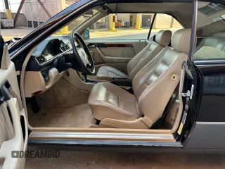 1995 Mercedes-Benz E 320 with VIN WDBEA66E8SC239370, listed as a Copart auction lot 55871605 with 119,102 mi miles and Salvage Title. Bid and sale history available at DreamBid. Image 7.