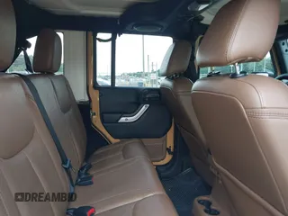 2013 Jeep Wrangler Unlimited Sahara with VIN 1C4BJWEG8DL638404, listed as a IAAI auction lot 42586604 with 43,953 mi miles and . Bid and sale history available at DreamBid. Image 8.