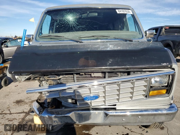 1988 Ford Econoline Cargo with VIN 1FDEE14H0JHC01117, listed as a Copart auction lot 84187634 with 74,931 mi miles and Clean Title. Bid and sale history available at DreamBid. Image 5.