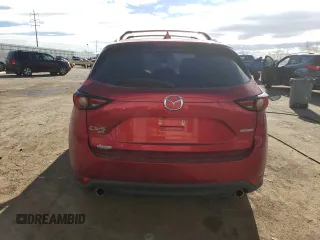 2020 Mazda CX-5 Grand Touring with VIN JM3KFBDM9L1820907, listed as a Copart auction lot 86166054 with 34,007 mi miles and Salvage Title. Bid and sale history available at carsss.com. Image 6.