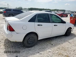 2007 Ford Focus S with VIN 1FAHP34NX7W225626, listed as a Copart auction lot 58202395 with 157,844 mi miles and Salvage title. Bid and sale history available at DreamBid. Image 3.