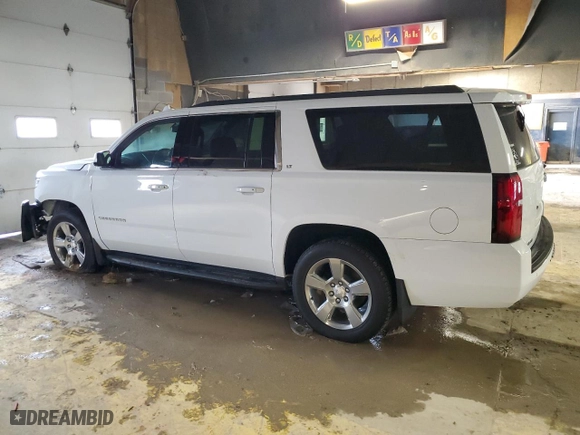 2020 Chevrolet Suburban LT with VIN 1GNSKHKC2LR187449, listed as a Copart auction lot 45943195 with 100,559 mi miles and Salvage Title. Bid and sale history available at carsss.com. Image 2.