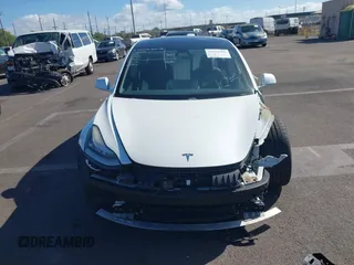 2019 Tesla Model 3 Long Range with VIN 5YJ3E1EBXKF413806, listed as a IAAI auction lot 41321906 with 24,635 mi miles. Bid and sale history available at carsss.com. Image 13.