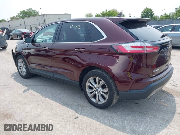 2019 Ford Edge Titanium with VIN 2FMPK4K96KBB20247, listed as a IAAI auction lot 42450212 with 121,756 mi miles and . Bid and sale history available at DreamBid. Image 3.