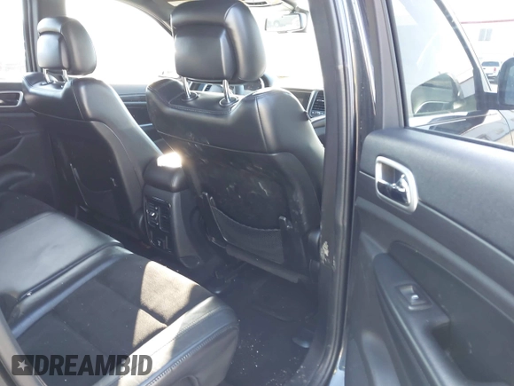2015 Jeep Grand Cherokee Laredo with VIN 1C4RJFAG6FC171751, listed as a IAAI auction lot 41487935 with 134,113 mi miles. Bid and sale history available at carsss.com. Image 8.