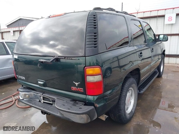 2002 GMC Yukon SLT with VIN 1GKEC13Z52R174419, listed as a IAAI auction lot 41724923 with 309,700 mi miles. Bid and sale history available at carsss.com. Image 4.