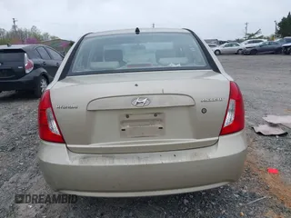 2006 Hyundai Accent GLS z VIN KMHCN46C66U058232, wystawiony jako IAAI lot #41899629 z przebiegiem 182 669 mil mil oraz . Historia ofert i sprzedaży dostępna na DreamBid. Obrazek 16.
