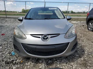 2011 Mazda 2 Sport z VIN JM1DE1HY1B0124249, wystawiony jako Copart lot #56141275 z przebiegiem 249 890 mil mil oraz Szkoda całkowita • Salvage title. Historia ofert i sprzedaży dostępna na DreamBid. Obrazek 5.