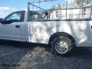 2019 Ford F-150 XL with VIN 1FTMF1CBXKKC54874, listed as a IAAI auction lot 41526336 with 112,563 mi miles. Bid and sale history available at carsss.com. Image 14.
