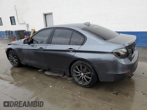 2013 BMW 3 Series 328i xDrive with VIN WBA3B5G50DNS05328, listed as a Copart auction lot 52989285 with 125,516 mi miles and Salvage title. Bid and sale history available at DreamBid. Image 2.