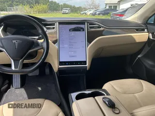 2014 Tesla Model S 60 z VIN 5YJSA1H11EFP44322, wystawiony jako Copart lot #59038135 z przebiegiem 146 015 mil mil oraz Czysty tytuł • Clean title. Historia ofert i sprzedaży dostępna na DreamBid. Obrazek 9.