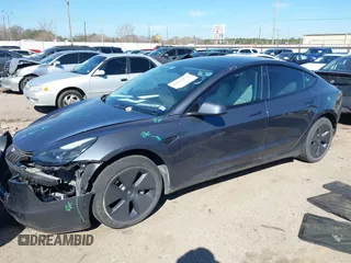 2022 Tesla Model 3 with VIN 5YJ3E1EAXNF326354, listed as a IAAI auction lot 41651872 with 27,922 mi miles and . Bid and sale history available at DreamBid. Image 20.