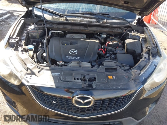 2014 Mazda CX-5 Sport with VIN JM3KE4BE6E0388909, listed as a IAAI auction lot 41876514 with 196,882 mi miles. Bid and sale history available at carsss.com. Image 10.