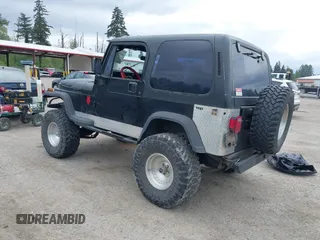 1994 Jeep Wrangler z VIN 1J4FY29S7RP474769, wystawiony jako IAAI lot #42283575 z przebiegiem 154 422 mil mil oraz . Historia ofert i sprzedaży dostępna na DreamBid. Obrazek 3.