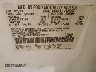 1999 Ford F-350 XL with VIN 1FTSW31F8XED52624, listed as a Copart auction lot 86359524 with 310,829 mi miles and Salvage title. Bid and sale history available at DreamBid. Image 12.