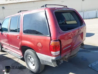 1999 Ford Explorer XLT with VIN 1FMZU35PXXZA67080, listed as a IAAI auction lot 42228465 with 212,488 mi miles and . Bid and sale history available at DreamBid. Image 13.