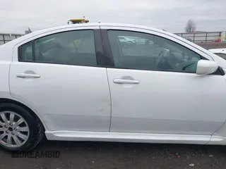 2010 Mitsubishi Galant FE with VIN 4A32B2FF9AE012837, listed as a IAAI auction lot 41196882 with 156,147 mi miles. Bid and sale history available at carsss.com. Image 13.