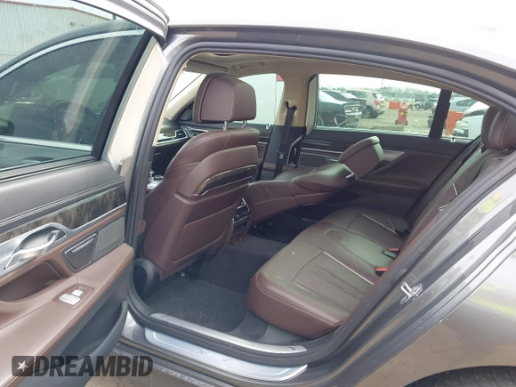 2017 BMW 7 Series 740i with VIN WBA7E2C54HG740170, listed as a IAAI auction lot 41432578 with 110,893 mi miles and . Bid and sale history available at DreamBid. Image 8.