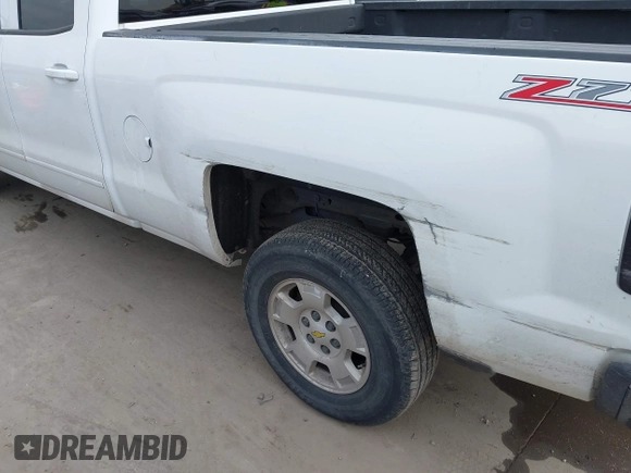 2015 Chevrolet Silverado 1500 LT with VIN 1GCRCREC3FZ425576, listed as a IAAI auction lot 41903363 with 114,156 mi miles and . Bid and sale history available at DreamBid. Image 17.
